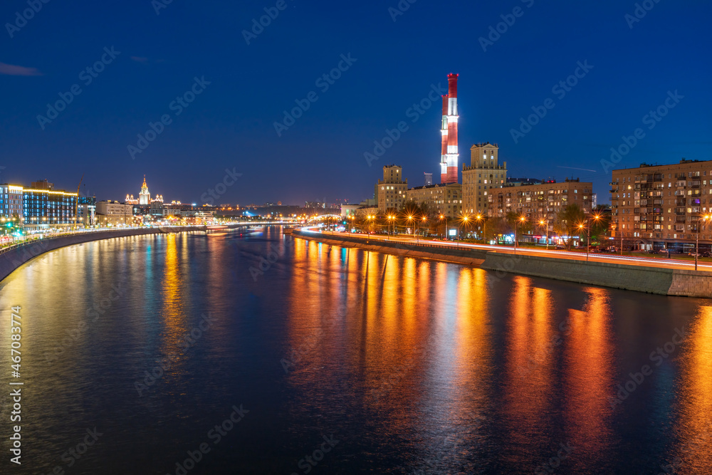 View on the Moscow river, Berezhkovskaya and Savvinskaya embankments in the evening, summer urban cityscape