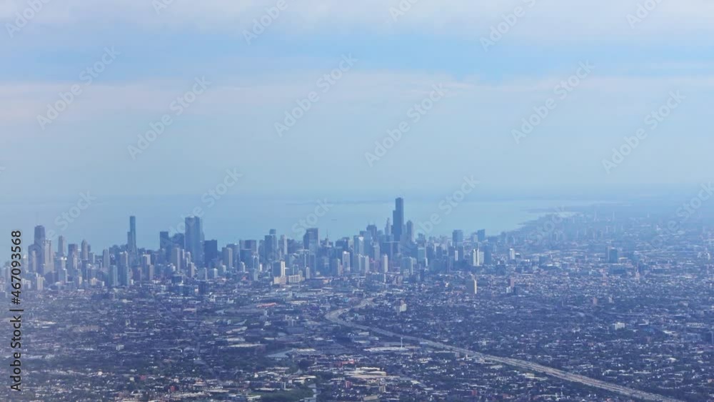 Chicago city skyline aerial on hazy summer day. Lake Michigan in background Chicago city skyline aerial on hazy summer day. Lake Michigan in background