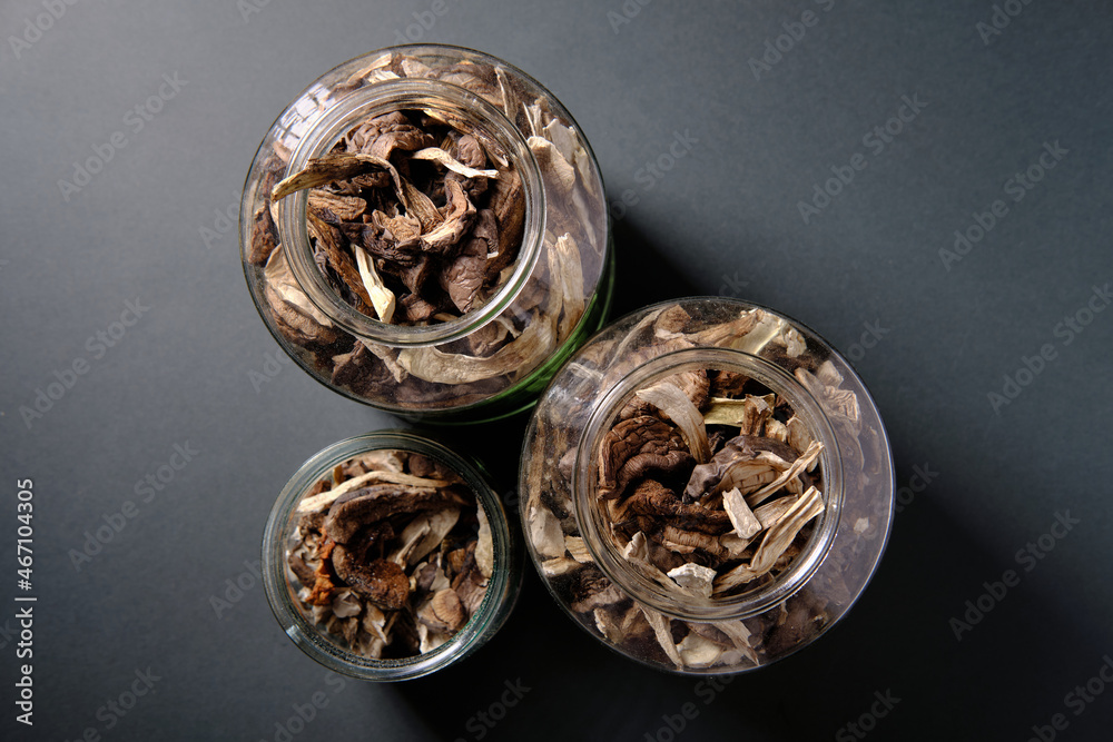 Dried mushrooms in a glass jar, top view