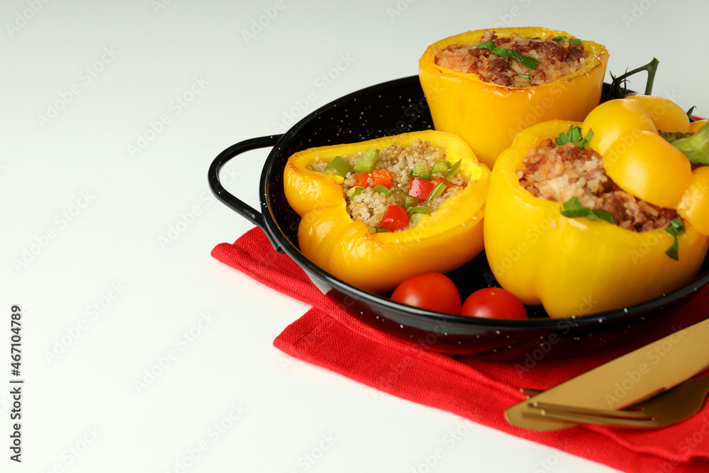 Concept of tasty food with stuffed pepper on white background Concept of tasty food with stuffed pepper on white background