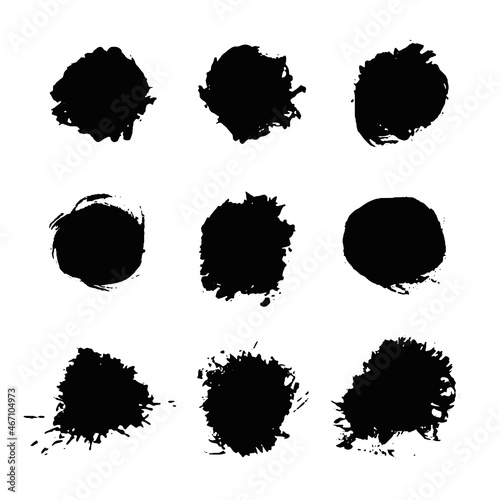 Black brush stains. Abstract hand painted texture. Vector grunge objects on white background