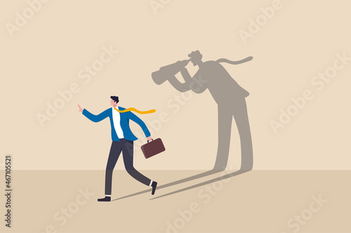 Internet stalker, espionage, online advertising tracking and follow users, spyware, safety, security and privacy issue concept, businessman walking with shadow using spyglass binocular stalking him.