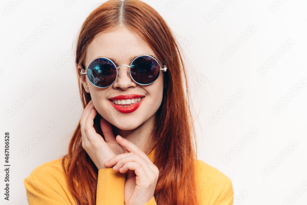 cheerful attractive woman in yellow shirt fashionable clothes sunglasses cheerful attractive woman in yellow shirt fashionable clothes sunglasses