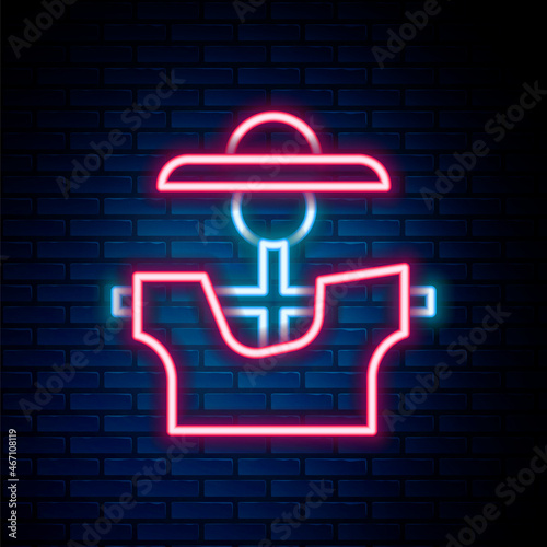 Glowing neon line Scarecrow icon isolated on brick wall background. Colorful outline concept. Vector