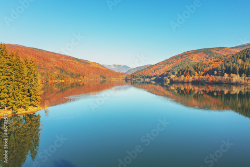 Beautiful mountain landscape with reflection in the lake in autumn