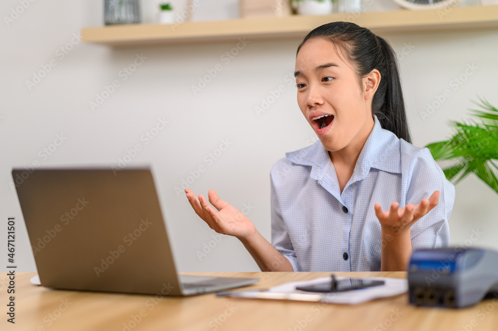 female employee working with laptop female employee working with laptop