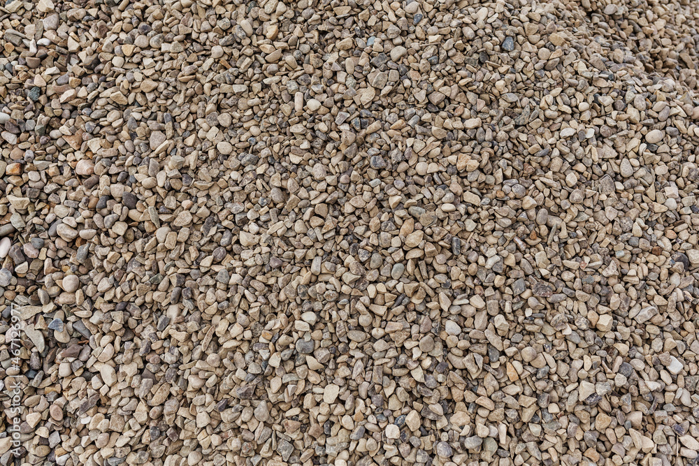 Background from rubble. Small gray stones on a background Background from rubble. Small gray stones on a background