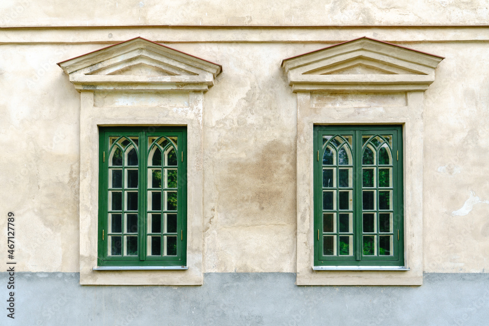 Two Symmetrical Green Vintage Windows