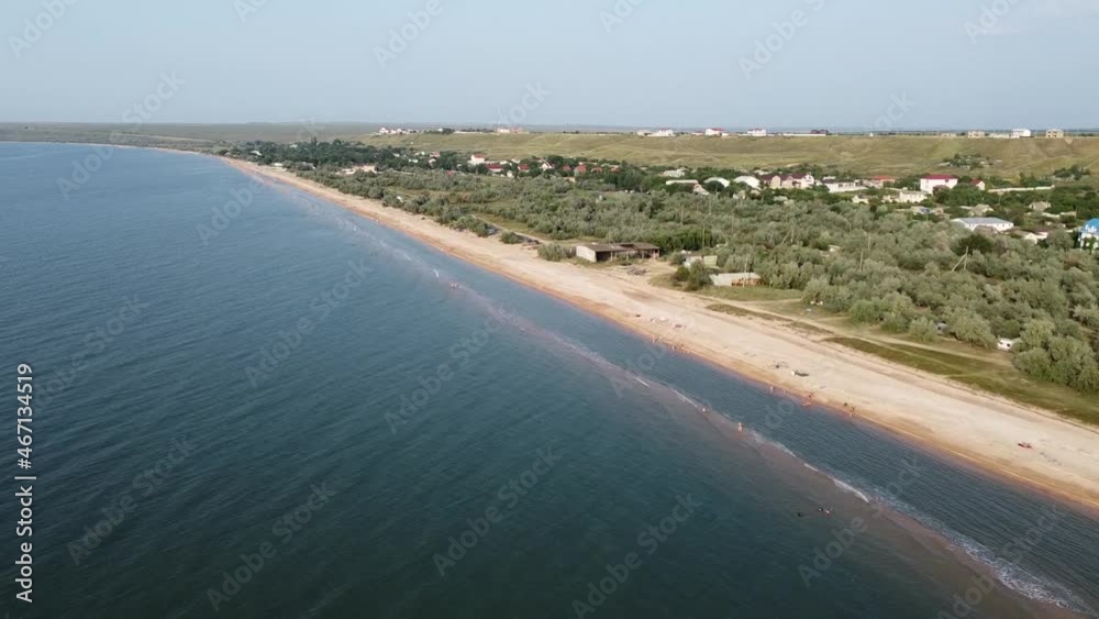 Aerial view of sandy beach during golden hour. Dolly shot. Aerial view of sandy beach during golden hour. Dolly shot.