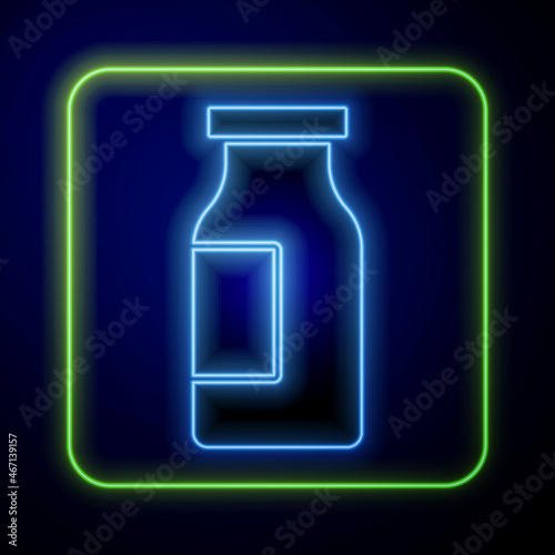 Glowing neon Closed glass bottle with milk icon isolated on blue background. Vector