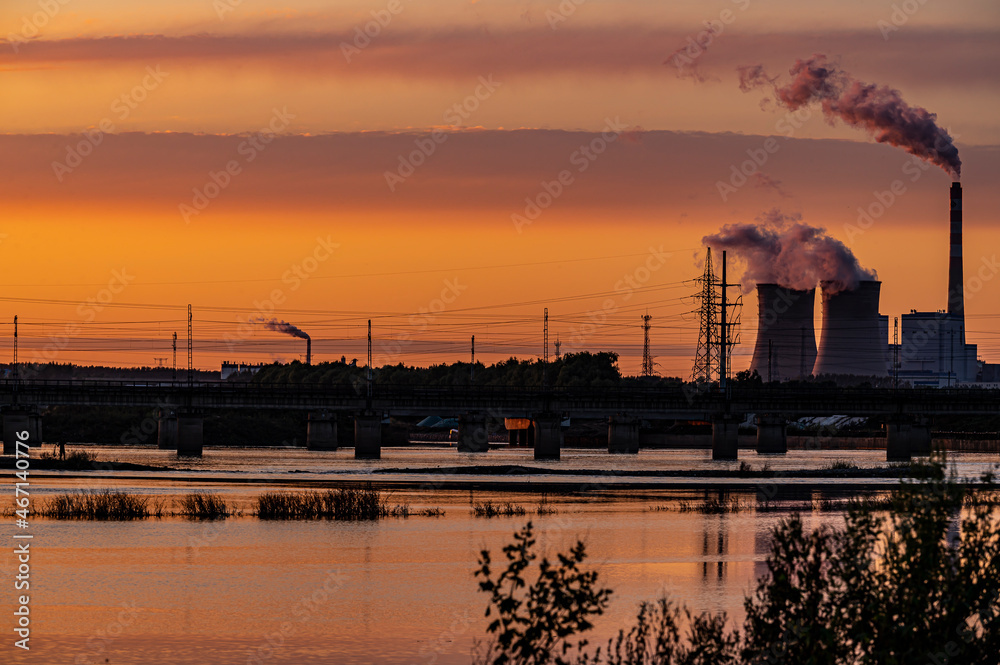 Thermal power plant under the setting sun