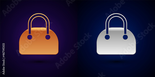 Gold and silver Handbag icon isolated on black background. Female handbag sign. Glamour casual baggage symbol. Vector