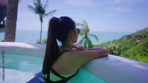 Girl Alone In Swimming Suit Relaxing In Luxurious Villa Sea View Infinity Pool