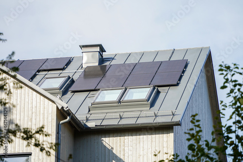 Modern house with solar panels on the gable roof