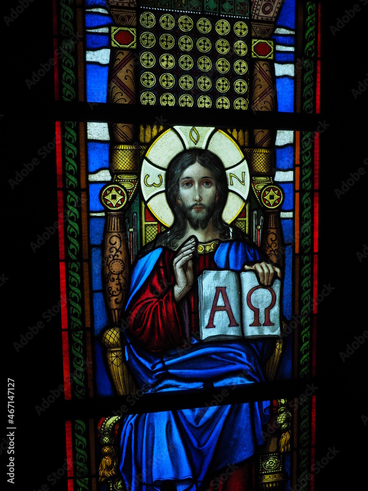 A stained glass window with Jesus Christ
