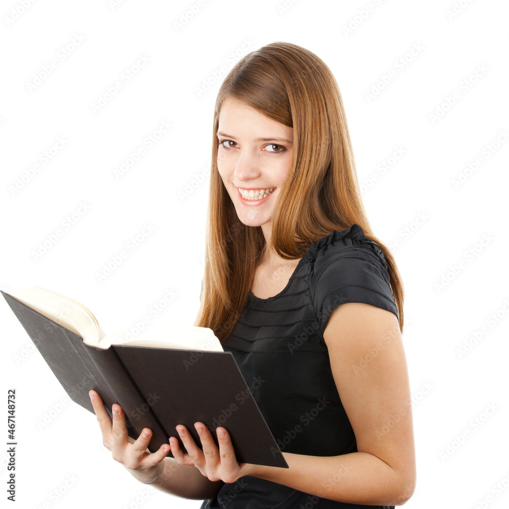Beautiful girl holding and reading her book, studio shot on white background Beautiful girl holding and reading her book, studio shot on white background