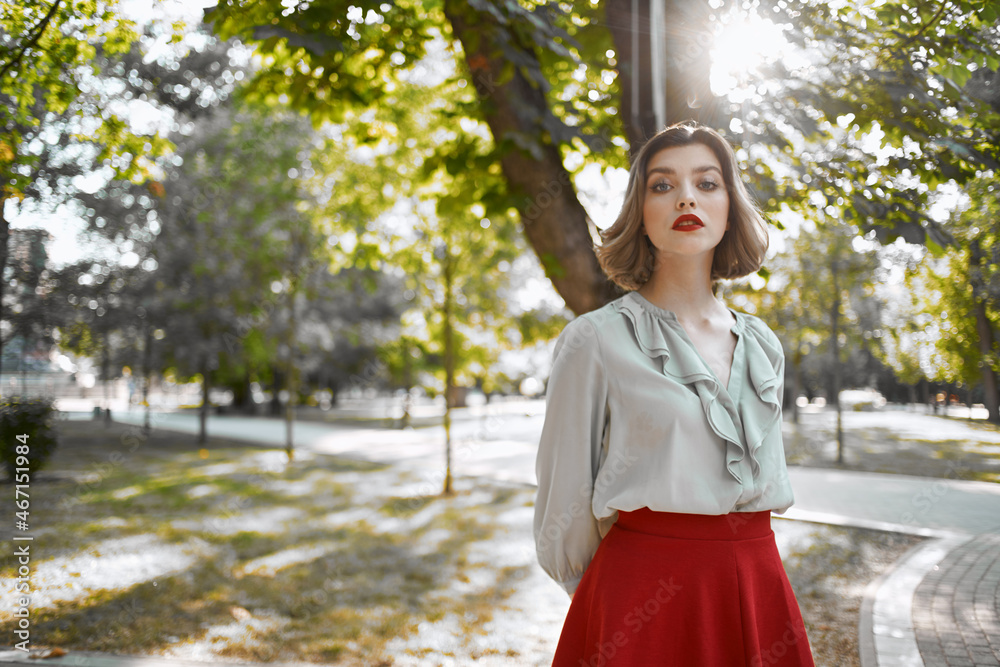 beautiful woman in a red skirt city walk fun leisure Fresh air beautiful woman in a red skirt city walk fun leisure Fresh air