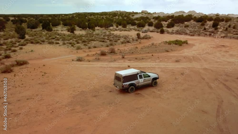 Aerial: Panning Descending Shot Of Vehicle Parked At Big Cottonwood Canyon - Kanab, Utah Aerial: Panning Descending Shot Of Vehicle Parked At Big Cottonwood Canyon - Kanab, Utah