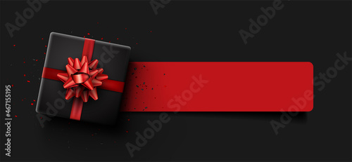 Obraz na plátne Black square gift box with red bow.