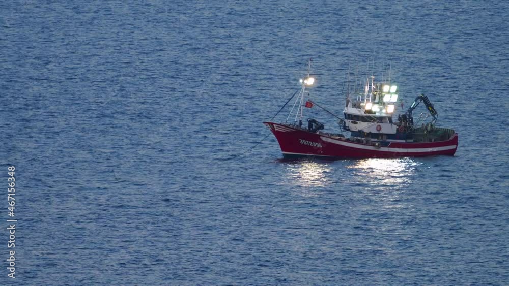 Aerial view of a fishing boat fishing in the Cantabrian Sea, Cantabria, Spain, Europe Aerial view of a fishing boat fishing in the Cantabrian Sea, Cantabria, Spain, Europe