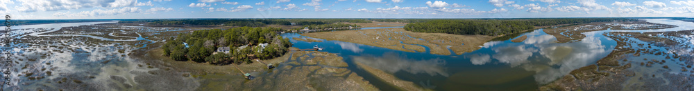 Aerial 360 degree view of islands, homes, and water in Beaufort, South Carolina.