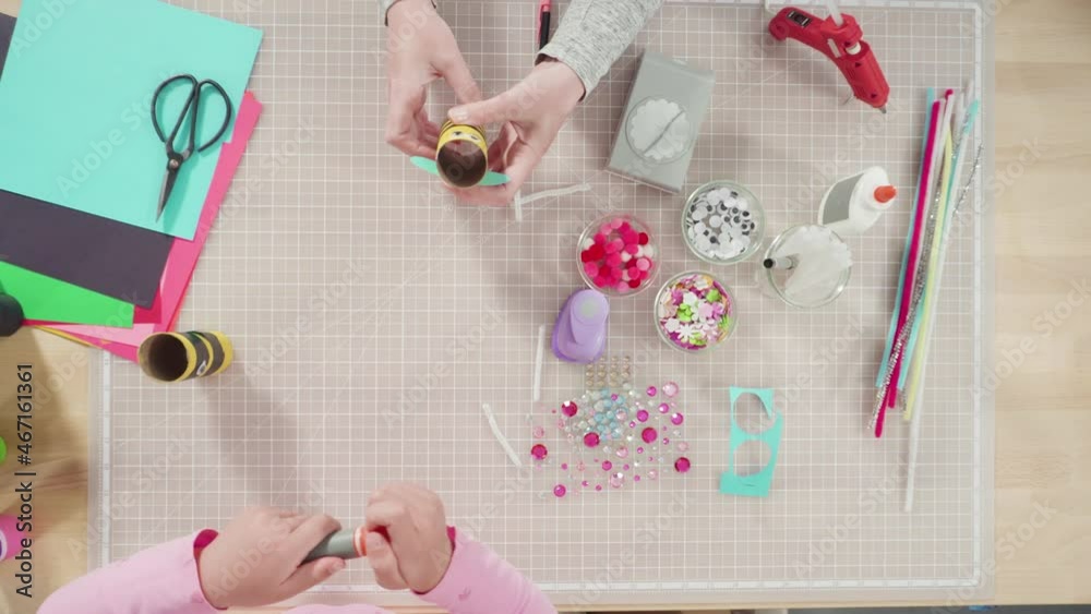 Flat lay. Kids papercraft. Making paper bugs out of the empty toilet paper rolls and construction paper. Flat lay. Kids papercraft. Making paper bugs out of the empty toilet paper rolls and construction paper.