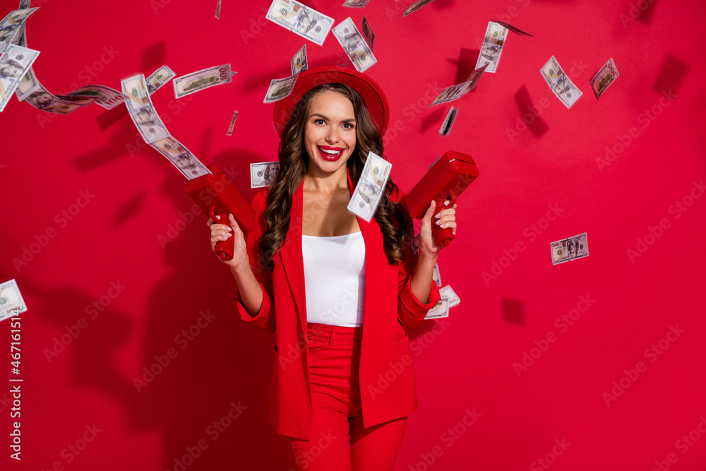 Photo of cool brunette lady spend money wear cap suit isolated on red color background Photo of cool brunette lady spend money wear cap suit isolated on red color background