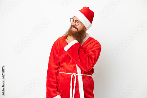 Reddish man disguised as Santa claus isolated on white looking to the side and smiling