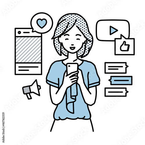 立ってスマートフォンでさまざまなSNSで楽しく交流するオフィスカジュアルの女性