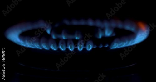 Burning gas, gas stove burner, hob in the kitchen. The concept of problems with natural gas, rising gas prices, and wastage. High quality 4k footage