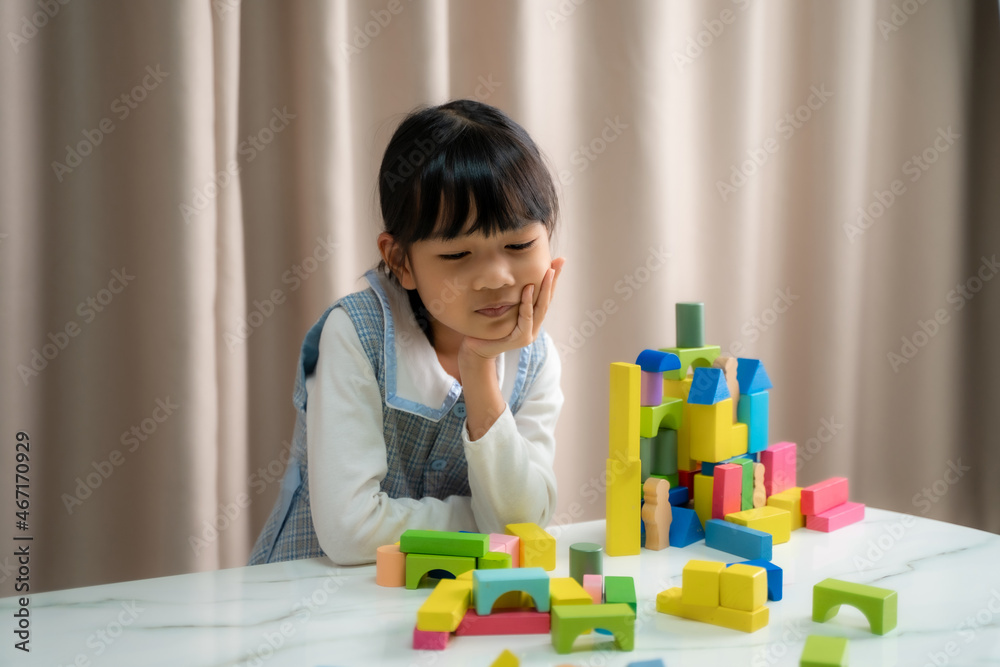 Children's are playing logical toy learning shapes arithmetic and colors at home,Kindergarten or nursery. Children's are playing logical toy learning shapes arithmetic and colors at home,Kindergarten or nursery.