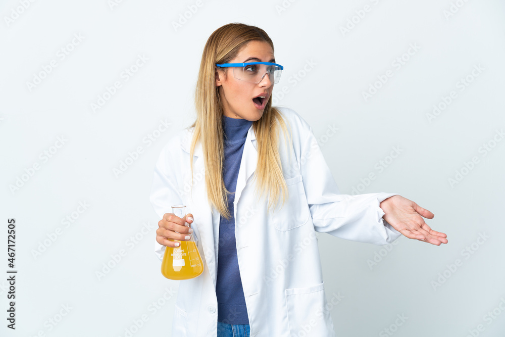 Young scientific woman isolated on white background with surprise expression while looking side Young scientific woman isolated on white background with surprise expression while looking side