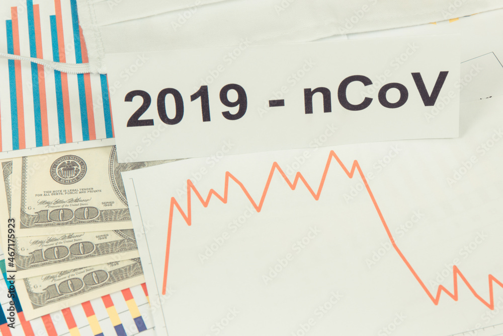 Currencies dollar with downward graphs representing financial crisis caused by coronavirus. Covid-19 Currencies dollar with downward graphs representing financial crisis caused by coronavirus. Covid-19