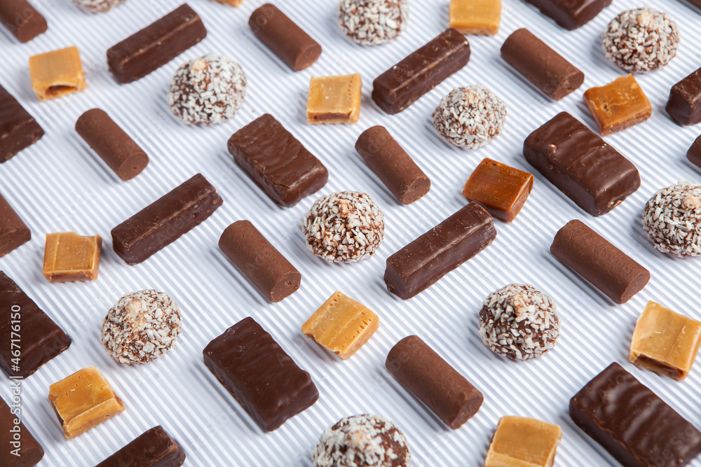 Assortment of delicious chocolate candies background. Chocolate candy isolated Assortment of delicious chocolate candies background. Chocolate candy isolated