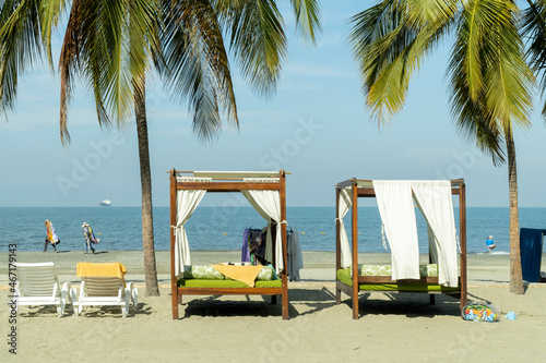 Kiosks on the shore of the beach overlooking the sea. Santa Marta, Magdalena, Colombia.  photo