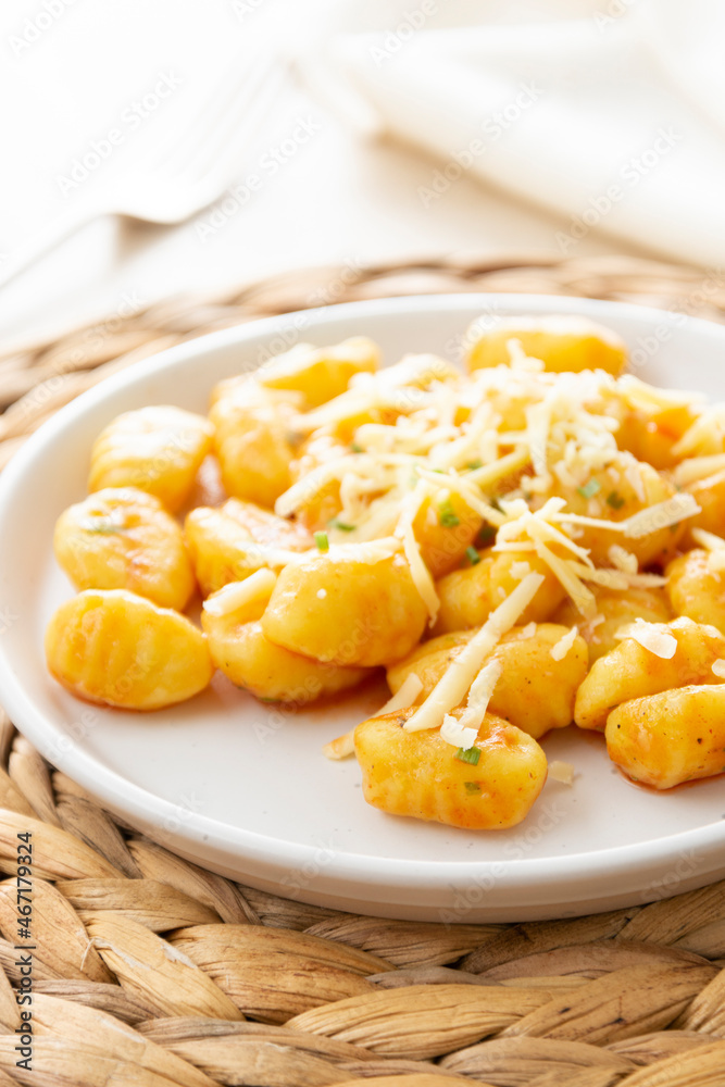 Gnocchi with cheese mediterranian food. Cooked gnocchi with butter and green onions. Gnocchi with cheese mediterranian food. Cooked gnocchi with butter and green onions.