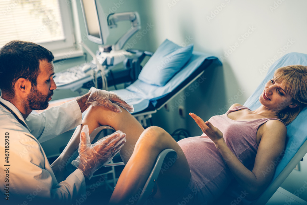 Obraz premium Gynecologist examination woman patient in a gynecological chair. Female health concept.