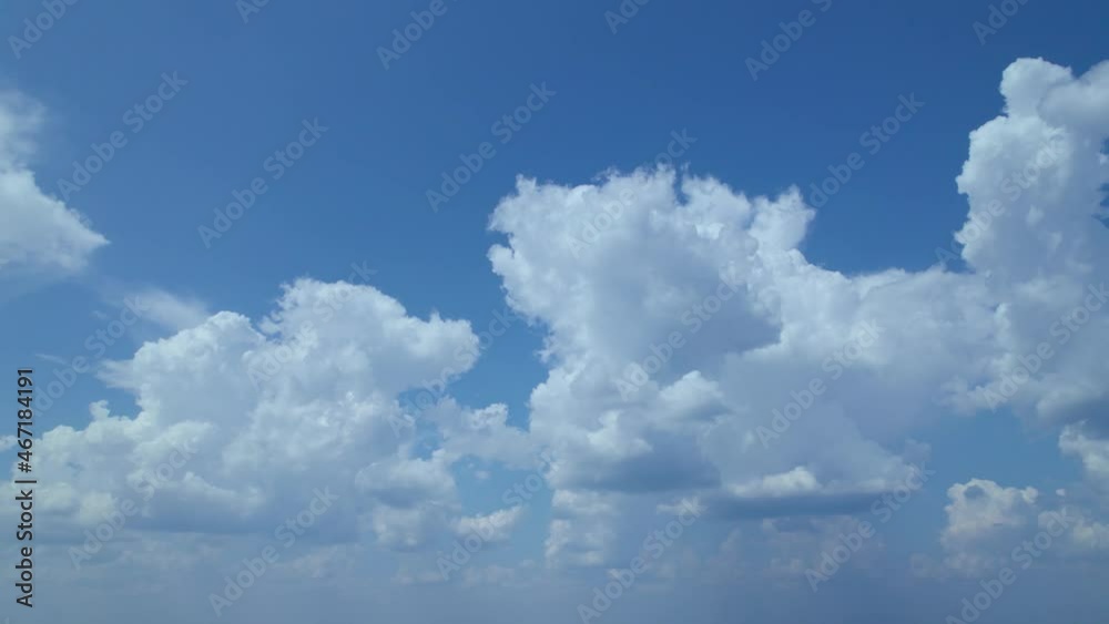 A clear blue sky with white cumulus clouds. An aerial view of the endless scenic skyscape on a bright, sunny day. A colorful and picturesque heaven shot with a fluffy cloudscape. A clear blue sky with white cumulus clouds. An aerial view of the endless scenic skyscape on a bright, sunny day. A colorful and picturesque heaven shot with a fluffy cloudscape.