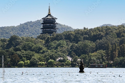 Beautiful scenery at the West Lake, Hangzhou, China - the Leifeng Pagoda rises over one of the 'three pools mirroring the moon' photo