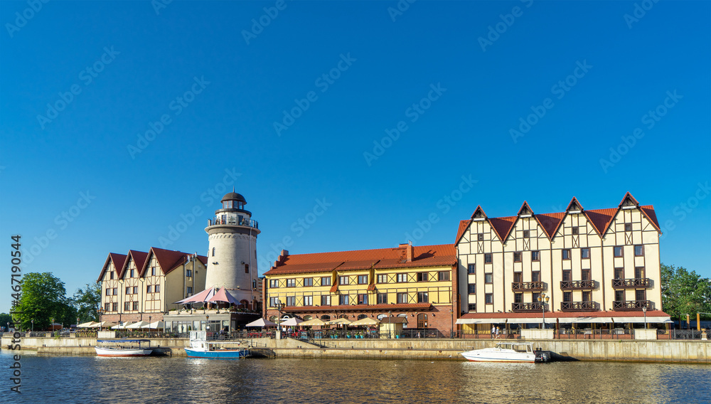 Obraz premium Fishing Village is ethnographic and trade-craft center in Kaliningrad, Russia on the banks of the Pregolya river. Architectural style of the pre-war East Prussian city of Konigsberg