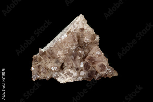 Macro mineral stone smoky quartz, rauchtopaz on a black background