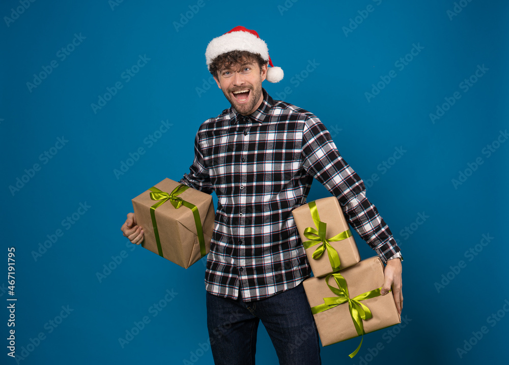 young man in New Year's mood preparing for the holidays young man in New Year's mood preparing for the holidays
