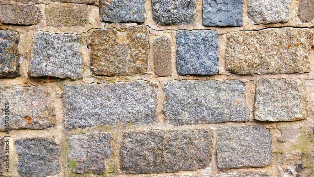 Detail view of wall structure made of block of stones connected with mortar. Detail view of wall structure made of block of stones connected with mortar.