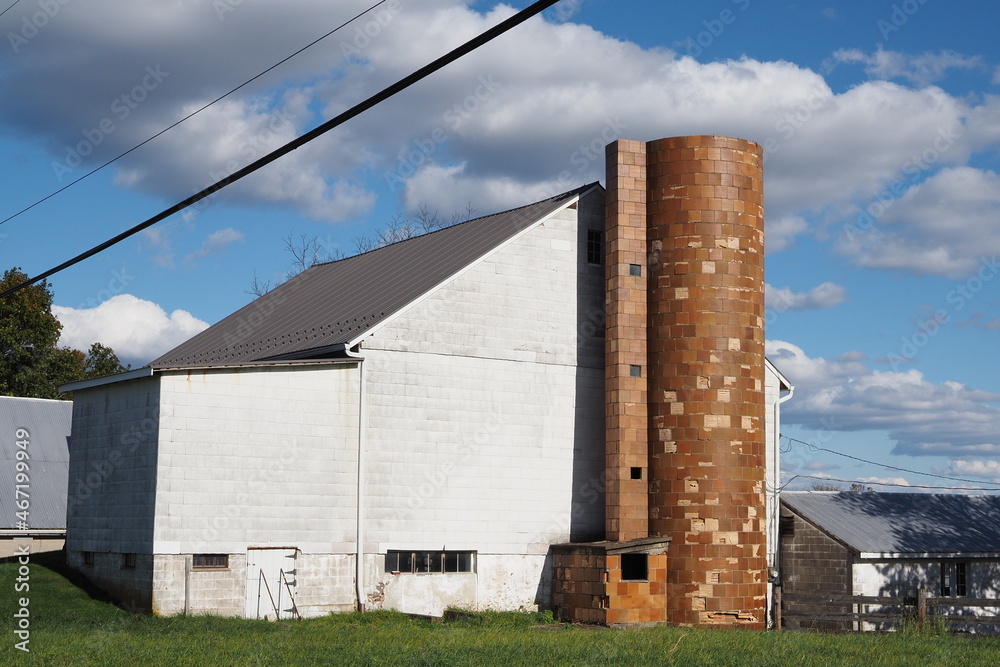 The silo and barn are very old on this working farm in Blooming Glen, PA. The silo and barn are very old on this working farm in Blooming Glen, PA.