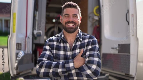 Portrait of an electrician happy worker at work