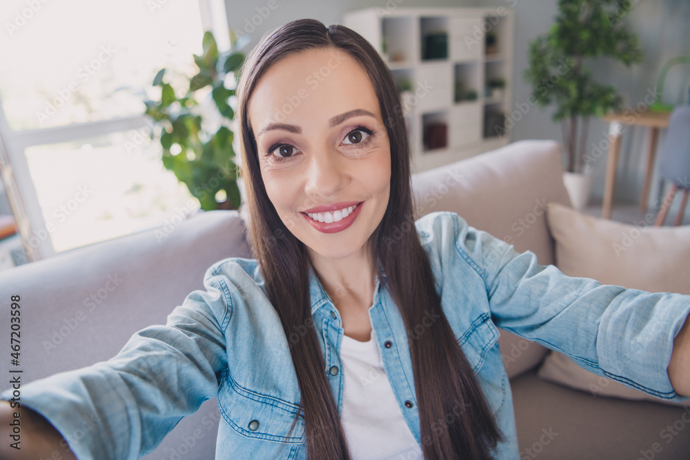 Self-portrait of attractive cheerful long-haired woman staying lonely safe health care at home indoors Self-portrait of attractive cheerful long-haired woman staying lonely safe health care at home indoors