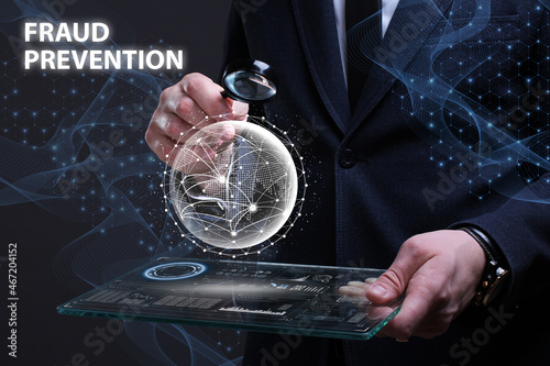 Business, Technology, Internet and network concept. Financial Graph. Stock Market chart. Young businessman working on a virtual screen of the future and sees the inscription: Fraud prevention