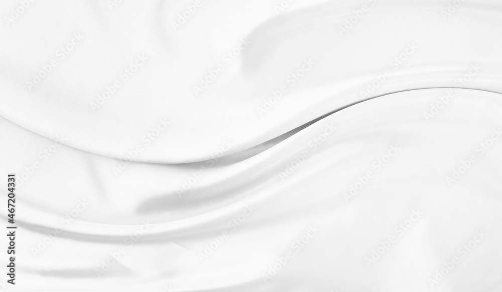 White gray satin texture that is white silver fabric silk background with beautiful soft blur pattern natural.