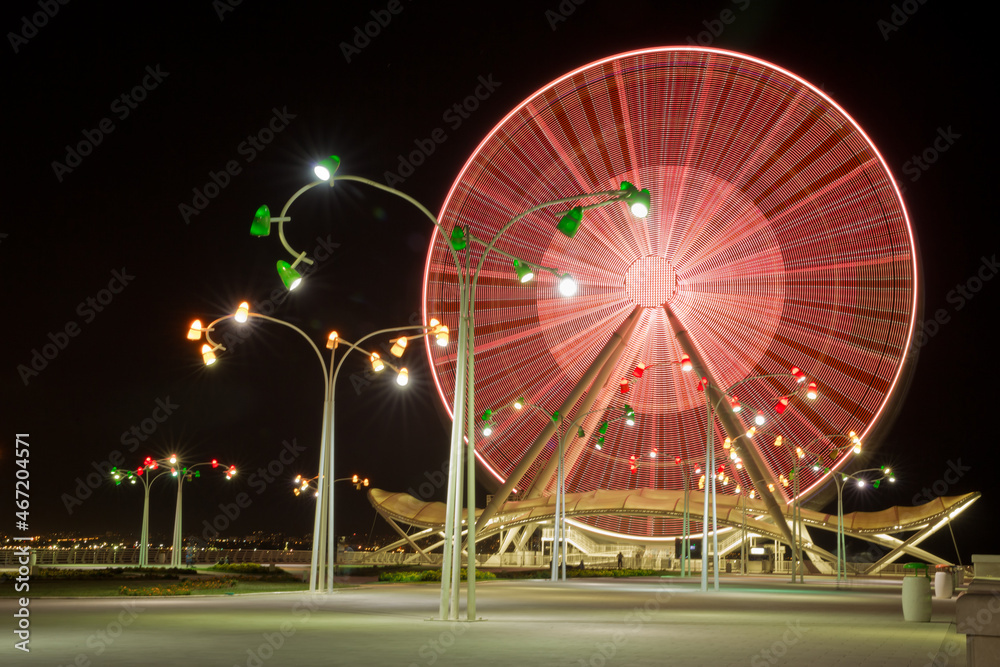 Attraction Ferris wheel installed on the embankment of Baku seaside Boulevard for the entertainment of tourists.