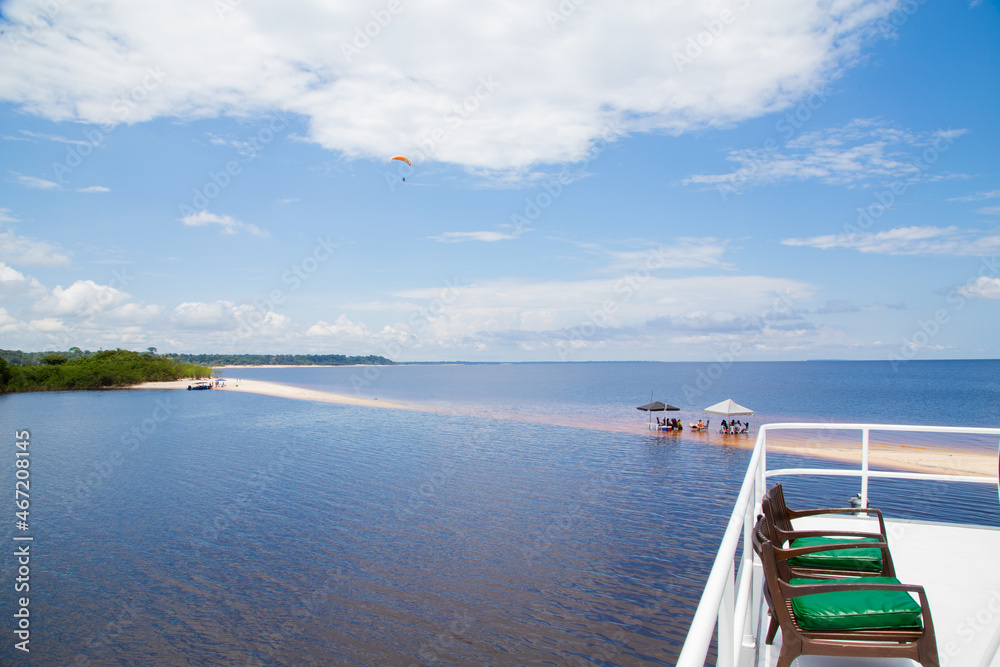 View from inside the beach on Eyruna boat af the Amazon river balck